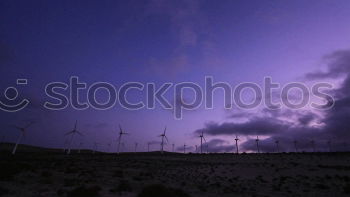 Similar – Windmills at sunset