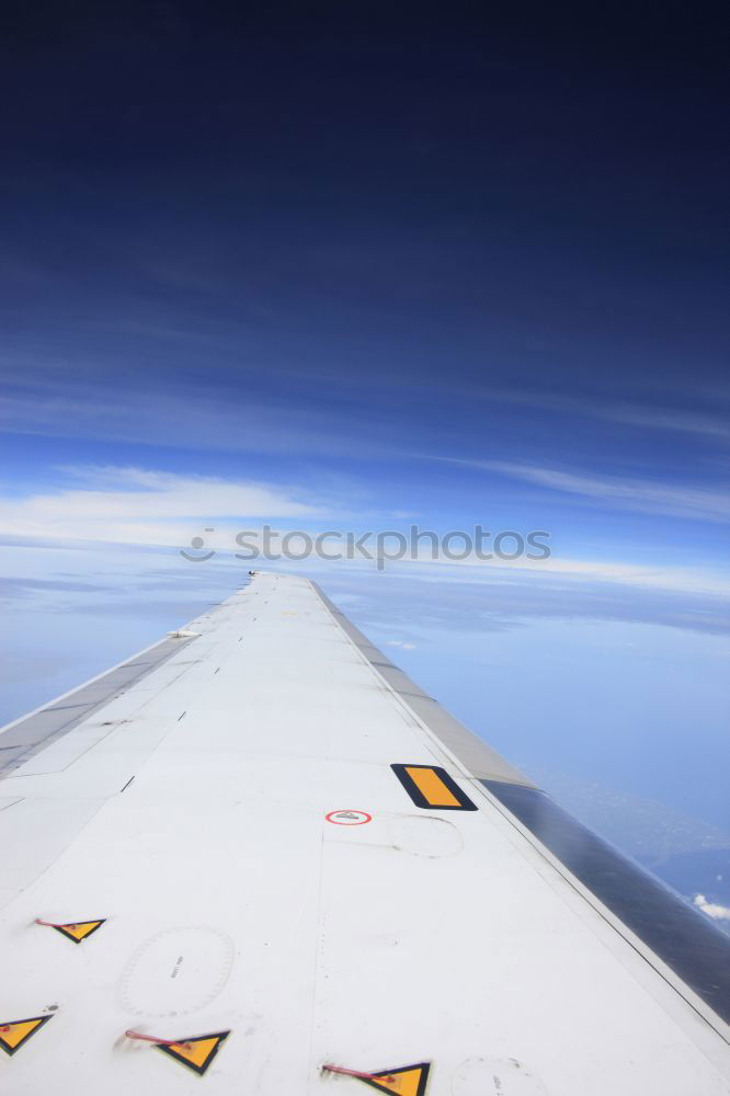 Similar – clouded view Wing Airplane