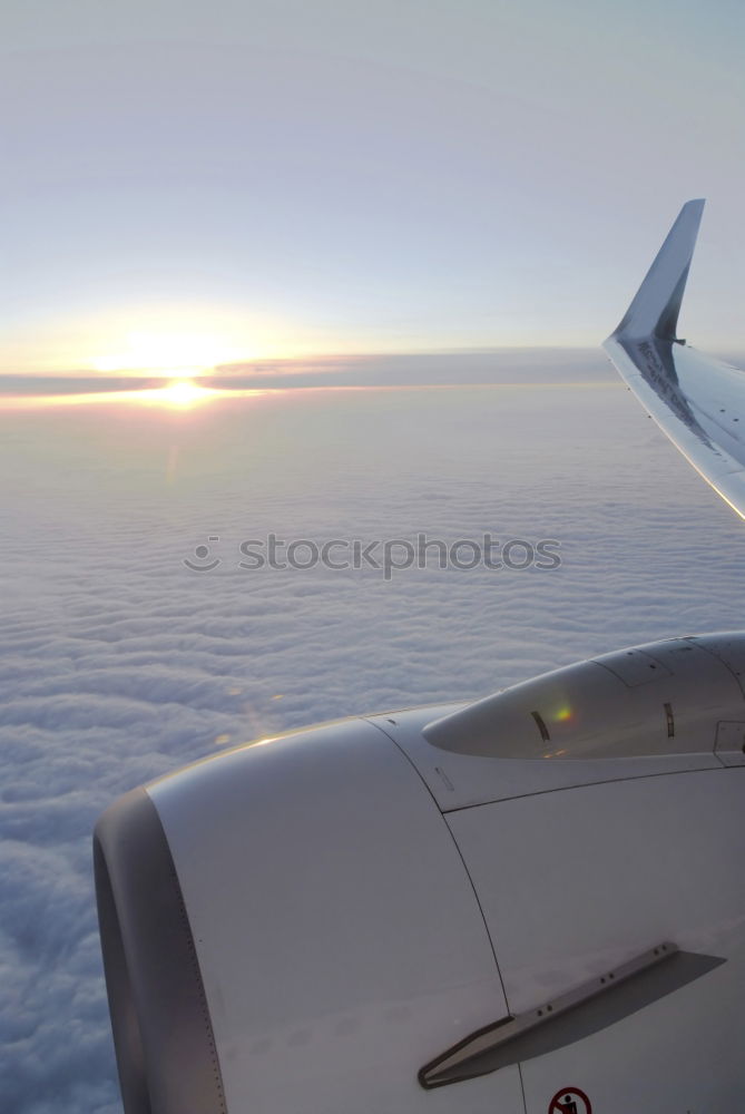 Similar – above the clouds Airplane