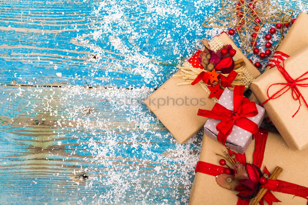 Similar – Some christmas presents in decorative boxes on a dark background