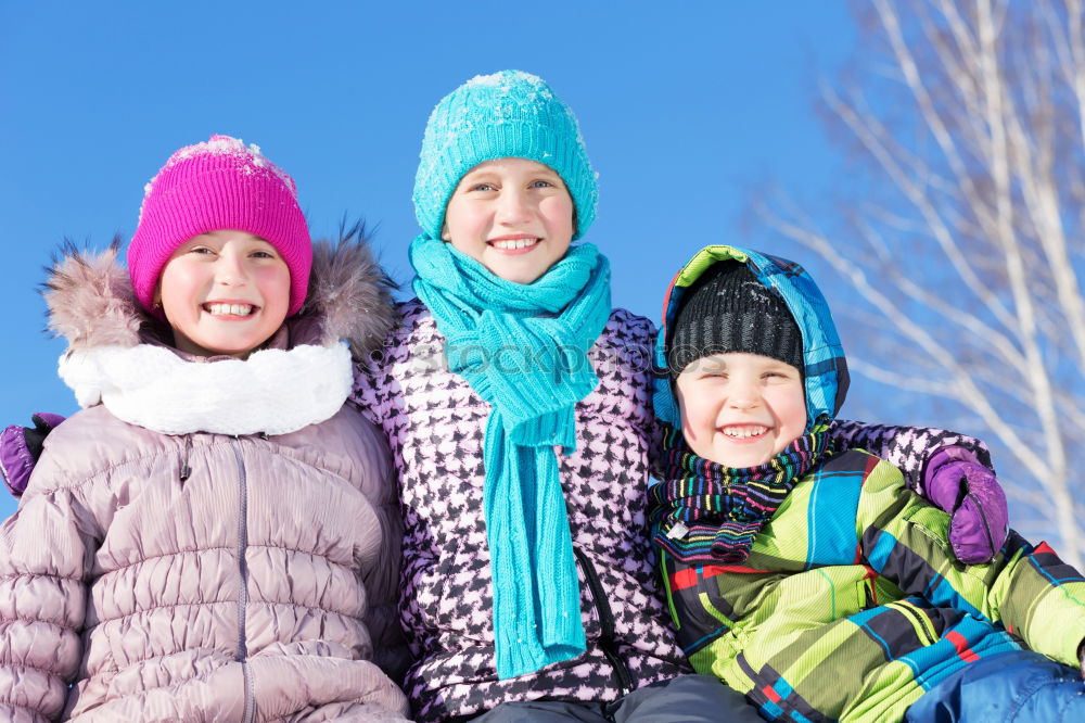 Similar – Cute little children playing in snow at a winter day. People having fun outdoors. Concept of Happy new year.