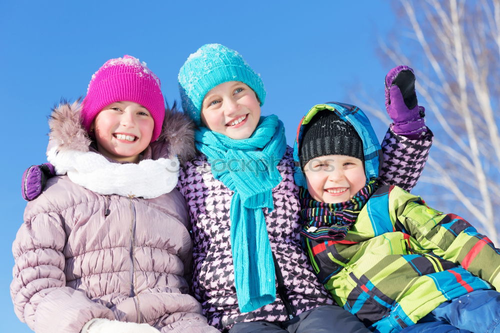 Similar – Cute little children playing in snow at a winter day. People having fun outdoors. Concept of Happy new year.