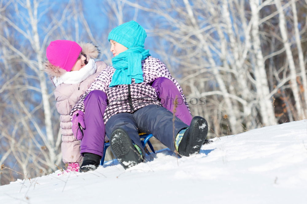 Similar – Teenage girl enjoying snow with her little sister