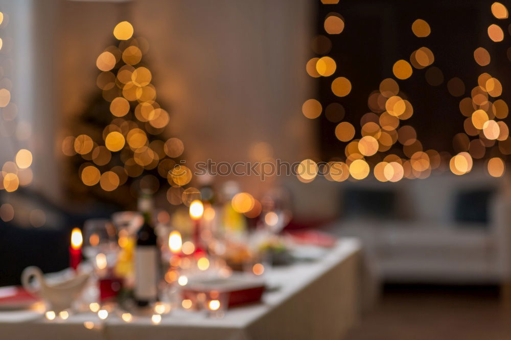 Similar – Christmas table set with biscuits and candles