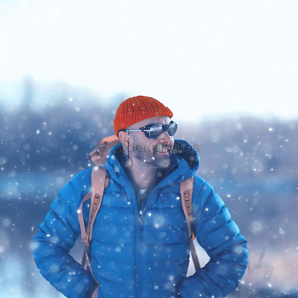 Similar – Image, Stock Photo Boy using the mobile phone during the winter trip