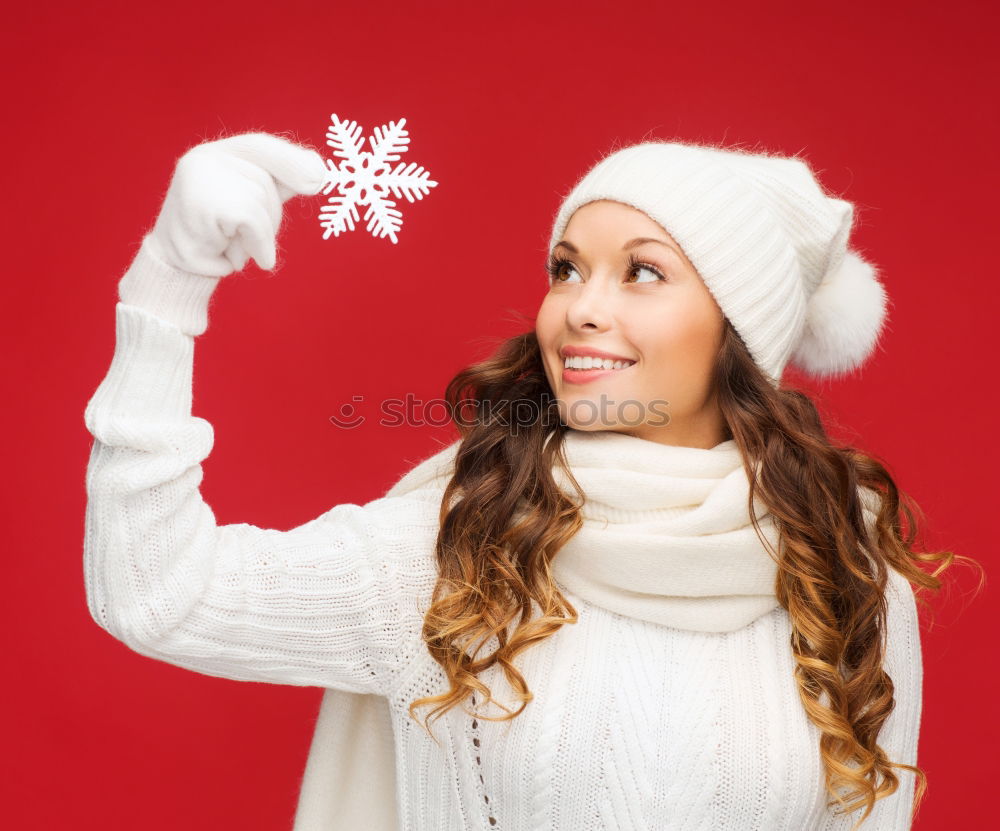 Brunette woman with red deer wool sweater