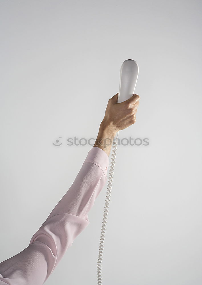 Similar – Woman answering an old retro telephone device. concept of changes in ways of communication