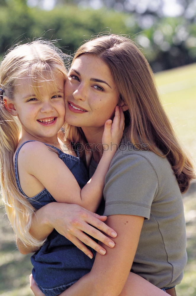 Similar – Image, Stock Photo Mom and daughter spending time in the park