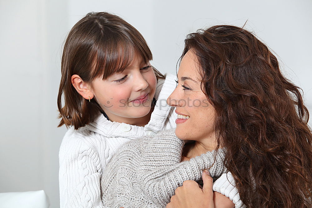 Similar – Image, Stock Photo Mother and daughter smiling and hugging outdoors