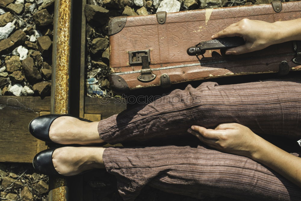 Similar – Woman and vintage suitcase