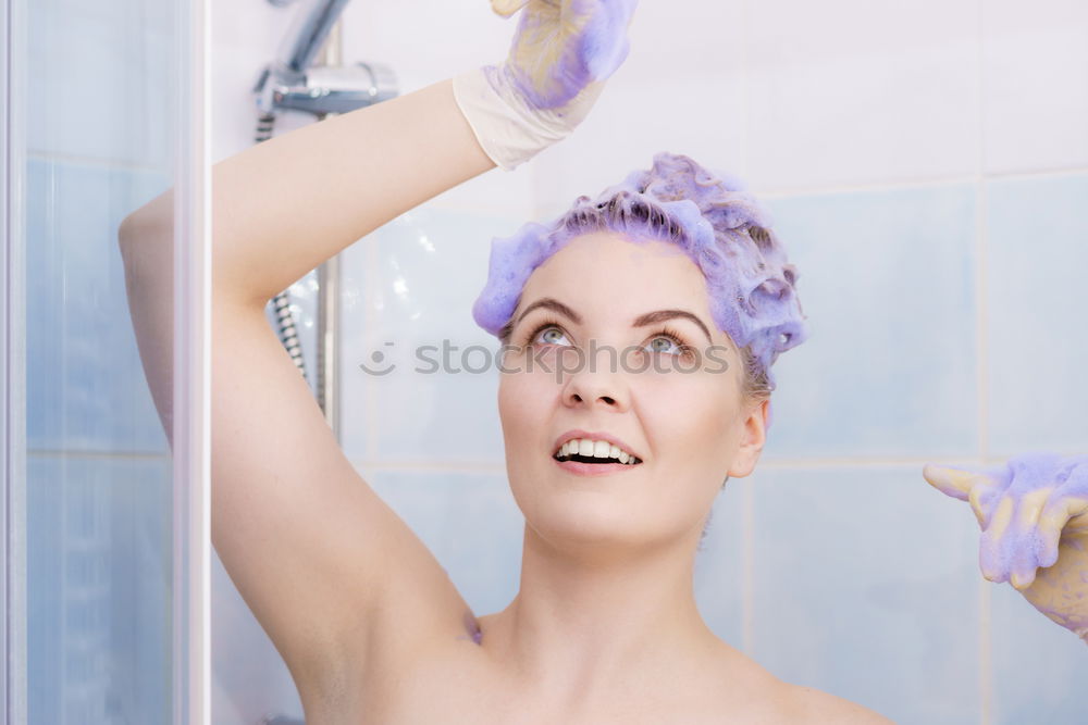 Similar – Playful mischievous woman with wet hair in a towel