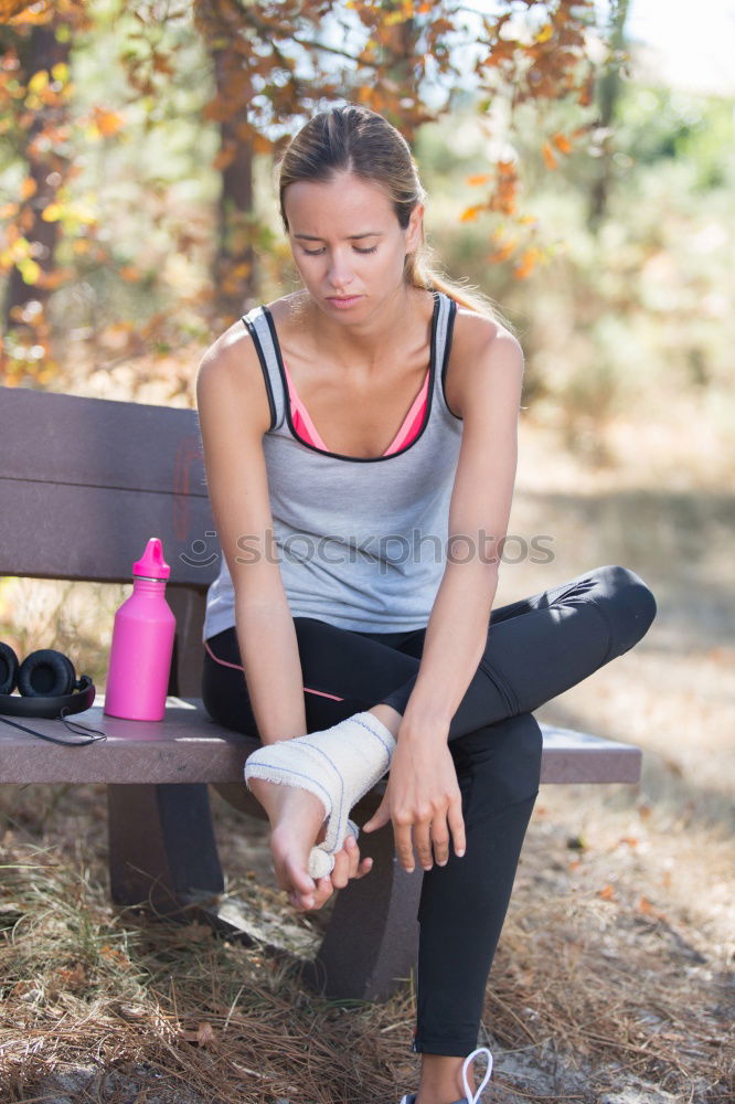 Similar – female runner resting