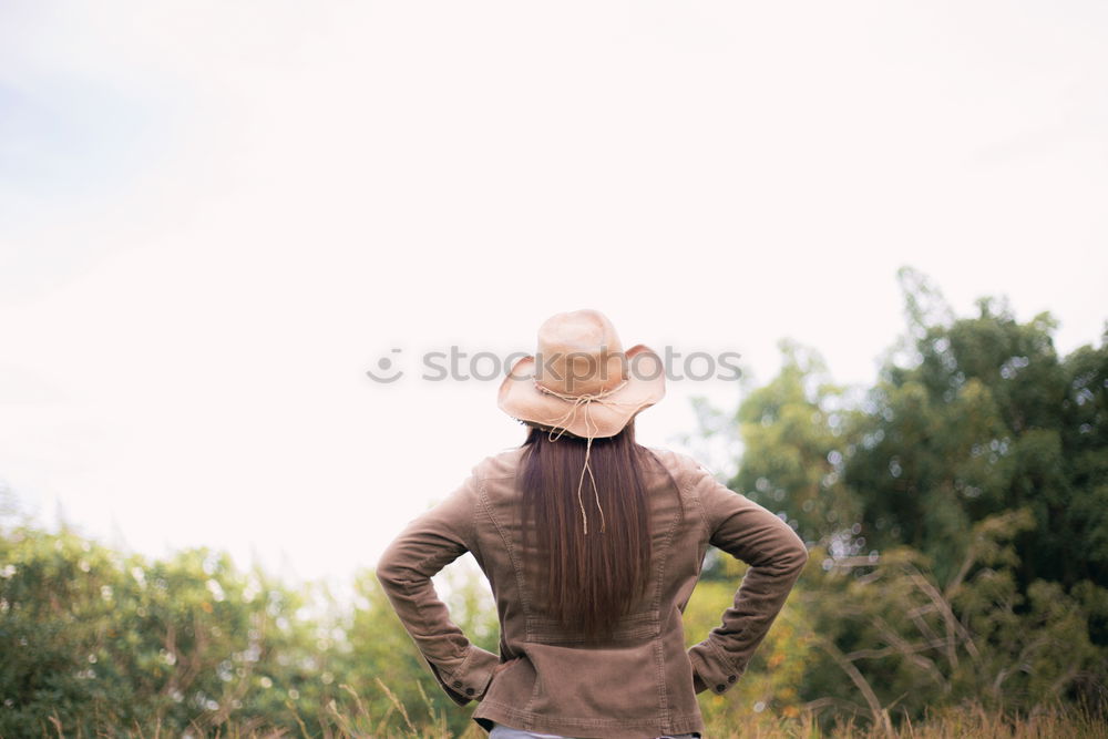 Similar – Bearded man in hat against sunlight