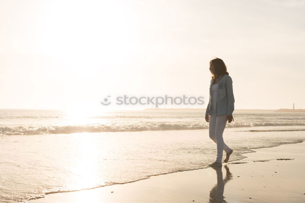 Similar – Woman standing on white cliffs by sea in England