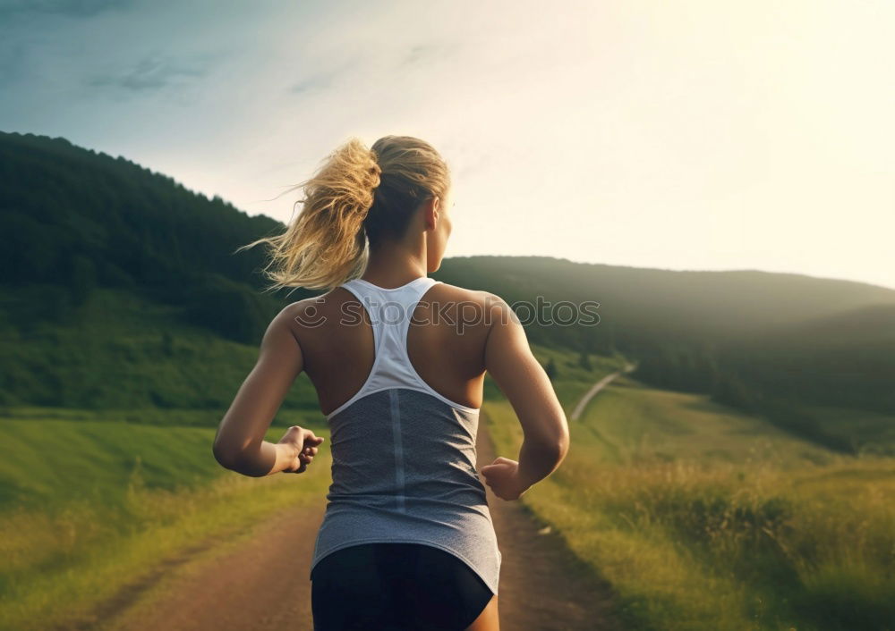 Similar – Woman jogging in countryside