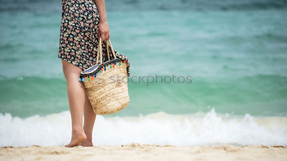 Similar – Group of girls holding surfboard on beach