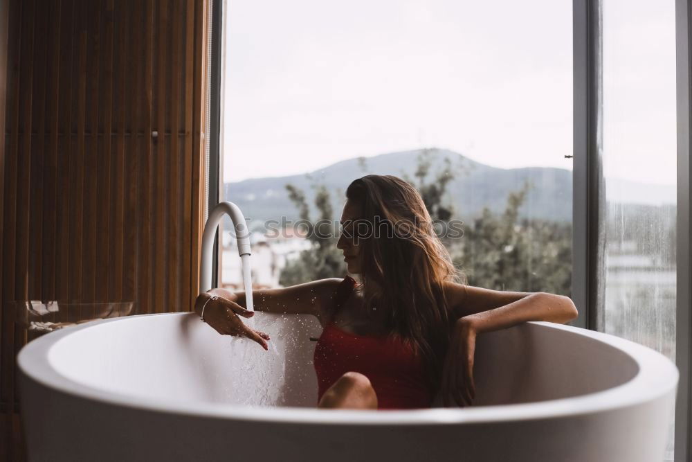 Similar – Image, Stock Photo Woman in a modern bath tub