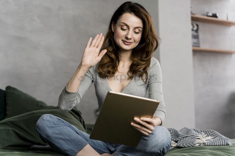 Similar – Image, Stock Photo Young couple reading book on couch at home