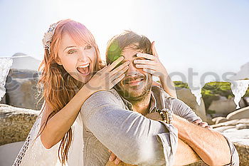 Similar – Image, Stock Photo Happy young adult couple with cute puppy