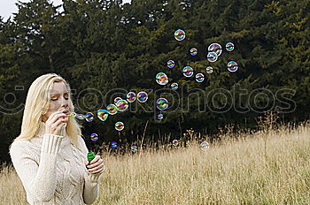 Similar – Soap bubbles. Joy Playing