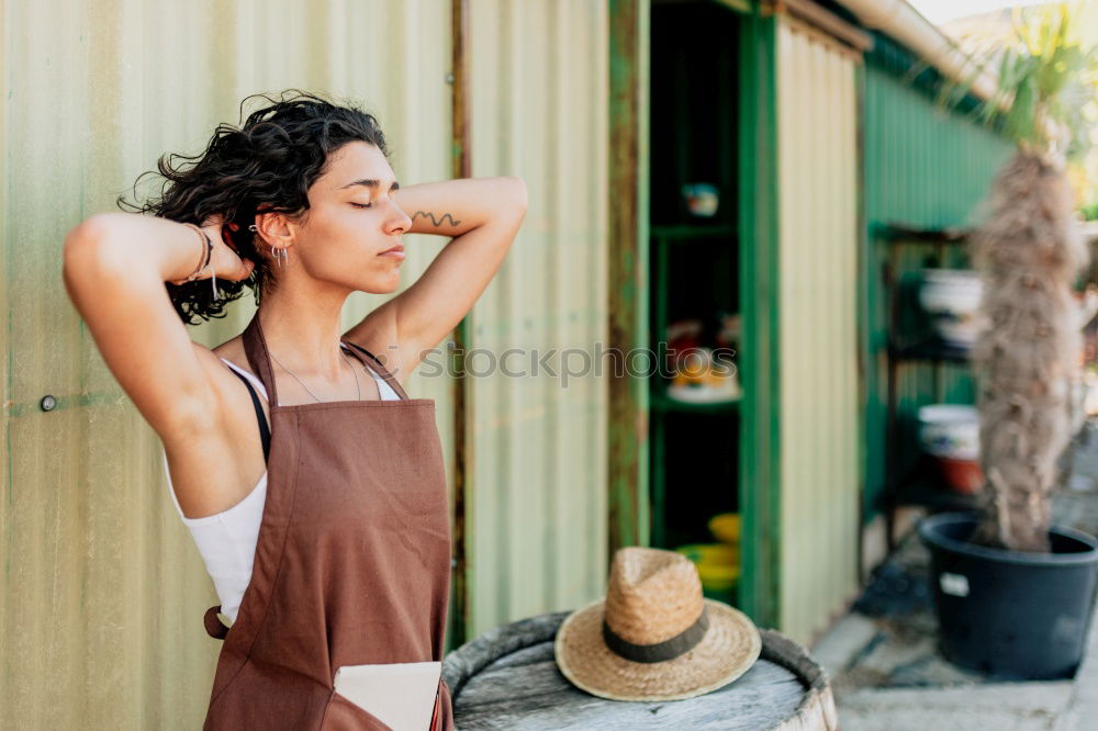 Similar – Image, Stock Photo Woman gardener, planting cactus plant in a pot