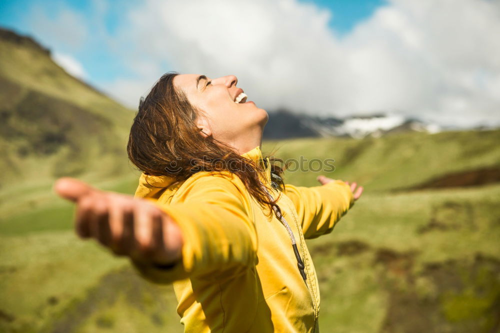 Similar – Image, Stock Photo Woman with wind ruffled hair looks up