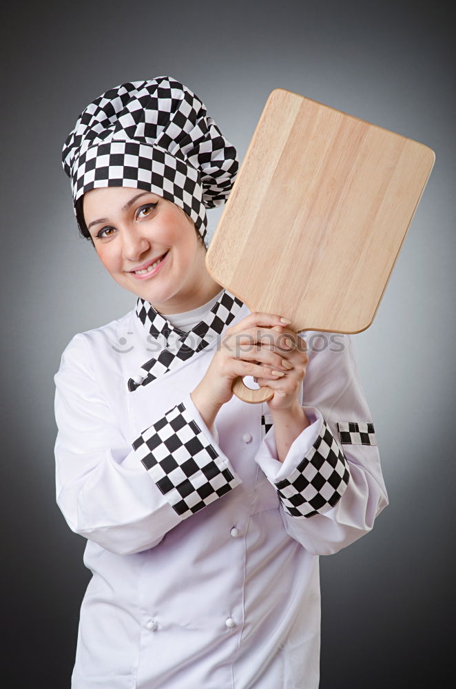 Similar – senior woman with cook hat and rolling pin and spatula on gray background