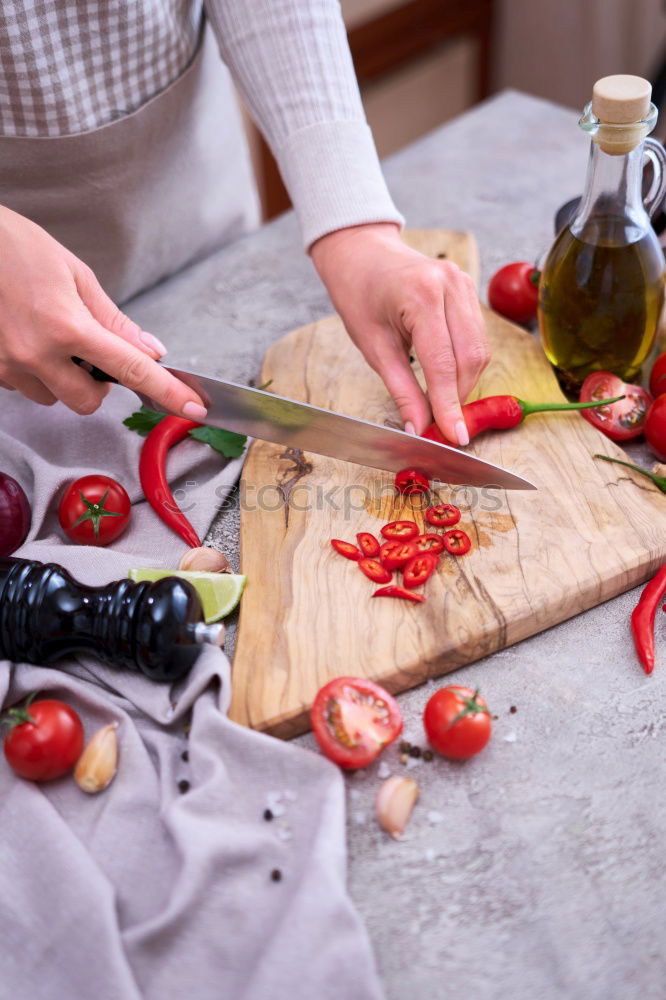 Similar – Sliced fresh carrots on a kitchen board