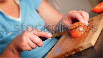 Similar – Sliced fresh carrots on a kitchen board