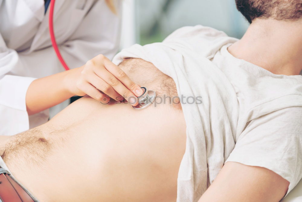 Similar – Image, Stock Photo young man at the physio therapy with pain