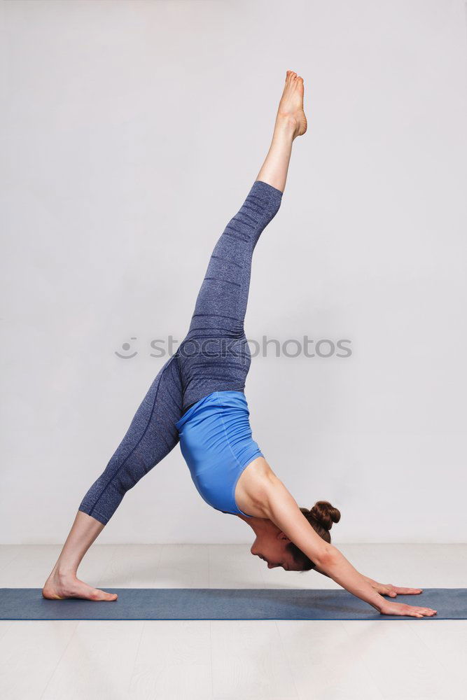 Yoga students showing different yoga poses.