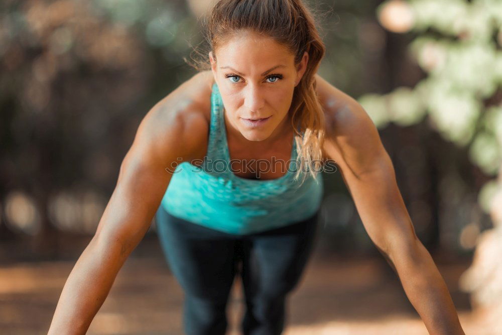 Similar – Woman doing exercises in aerobic class with a group on a fitness center