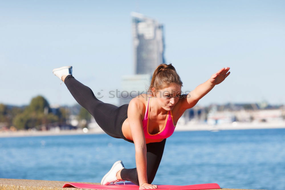 Similar – Black fit woman doing pushups on urban floor.