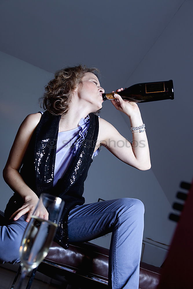 Similar – Image, Stock Photo Drunk woman giving middle finger and holding bottle in camper van