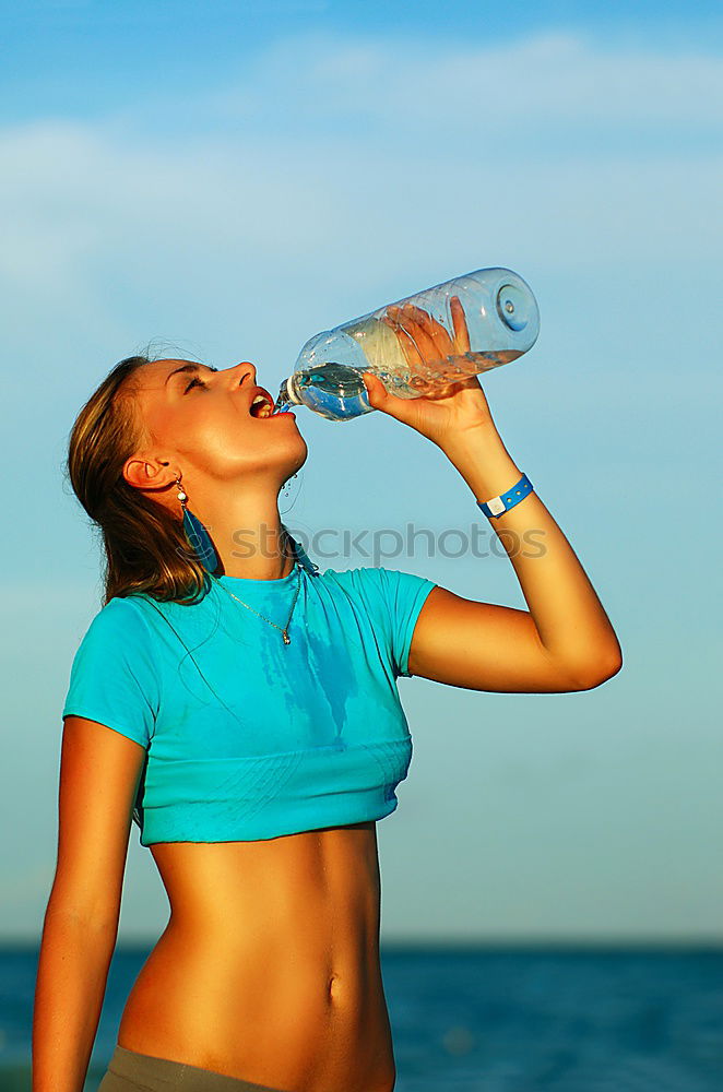 Similar – athletic woman resting and drinking