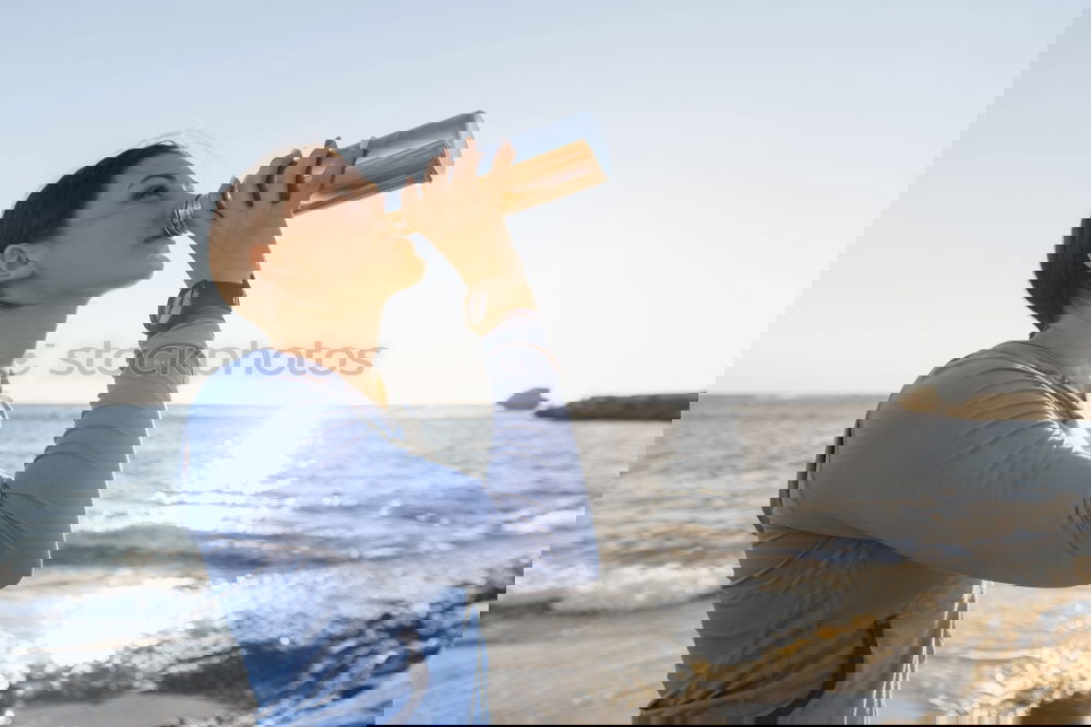 Similar – Image, Stock Photo Blonde girl drinking water during morning jogging