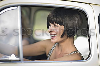 Similar – Image, Stock Photo Arab girl inside an old van parked in a campsite