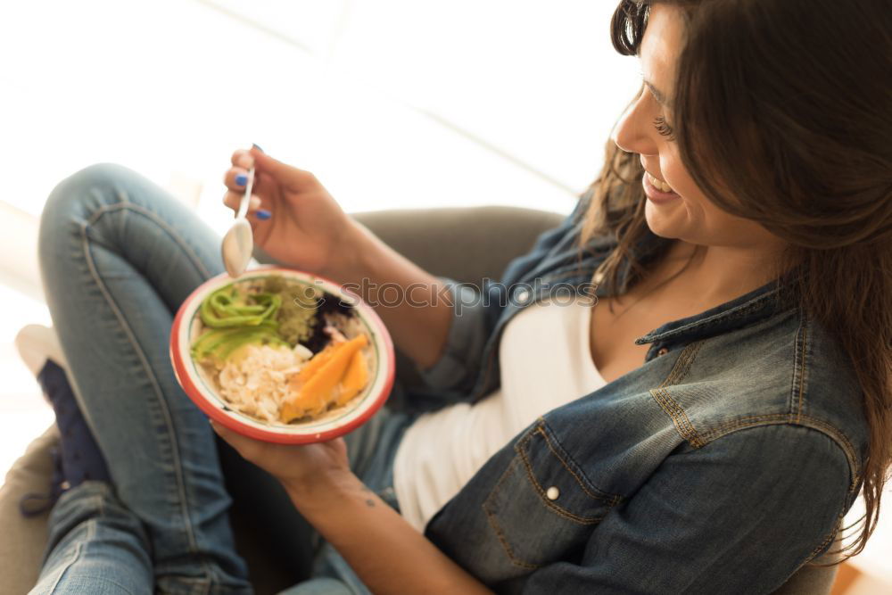 Similar – Crop woman eating sushi