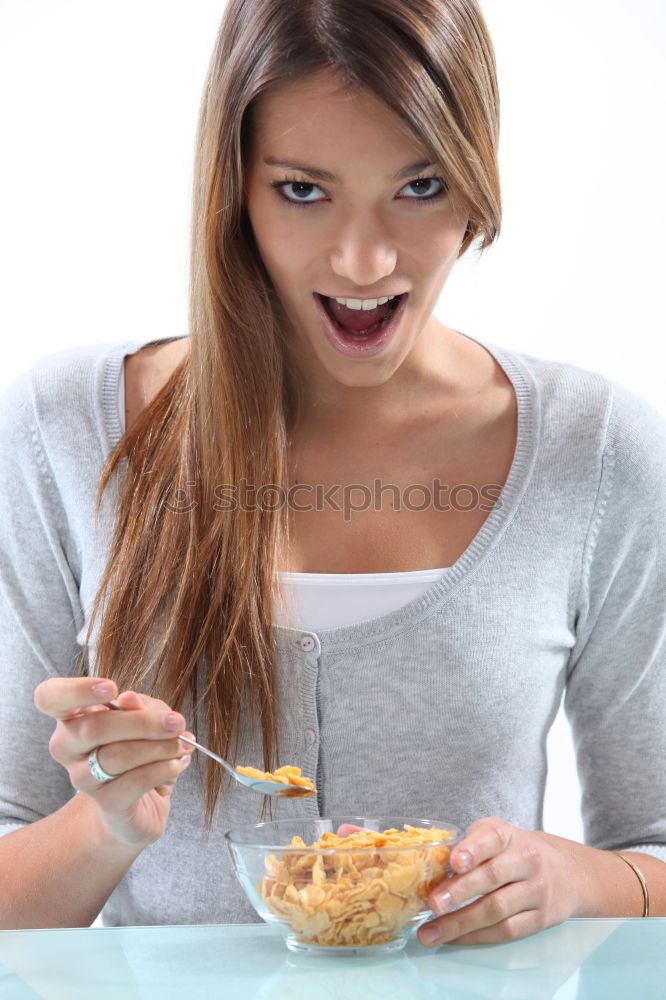 Similar – Crop woman eating sushi