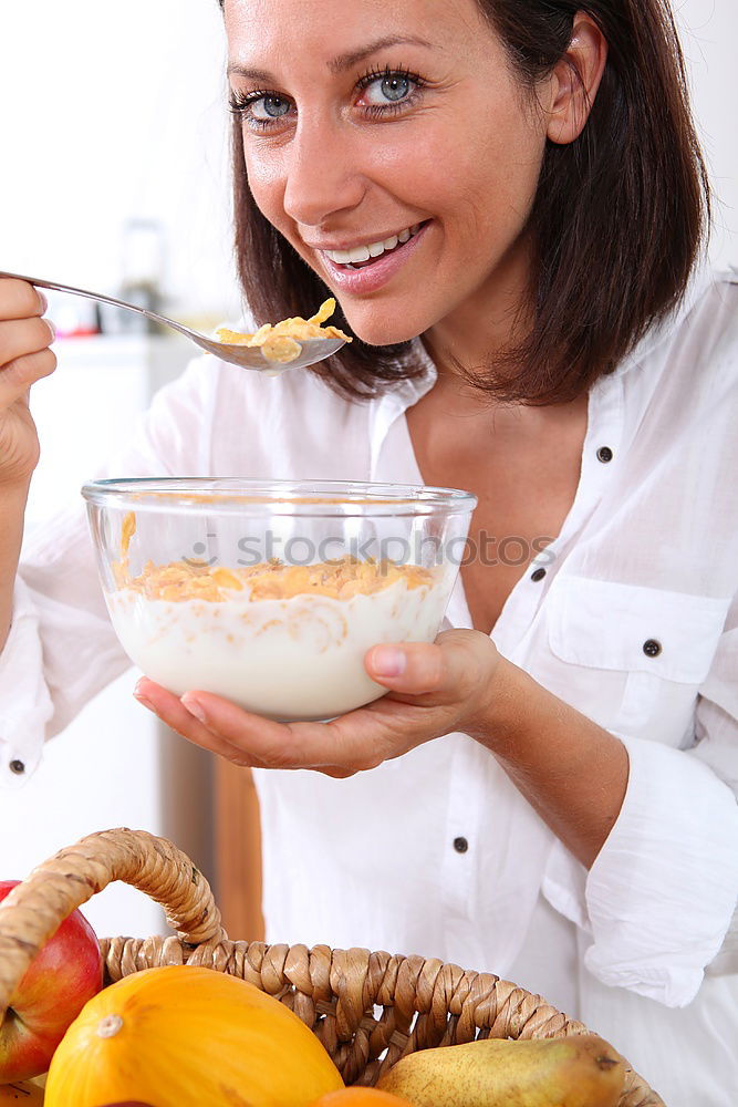 Similar – Image, Stock Photo woman close up eating oat and fruits bowl for breakfast