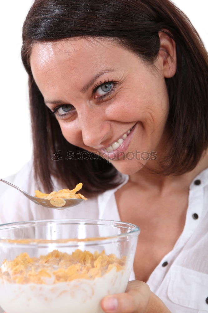 Similar – Image, Stock Photo woman close up eating oat and fruits bowl for breakfast