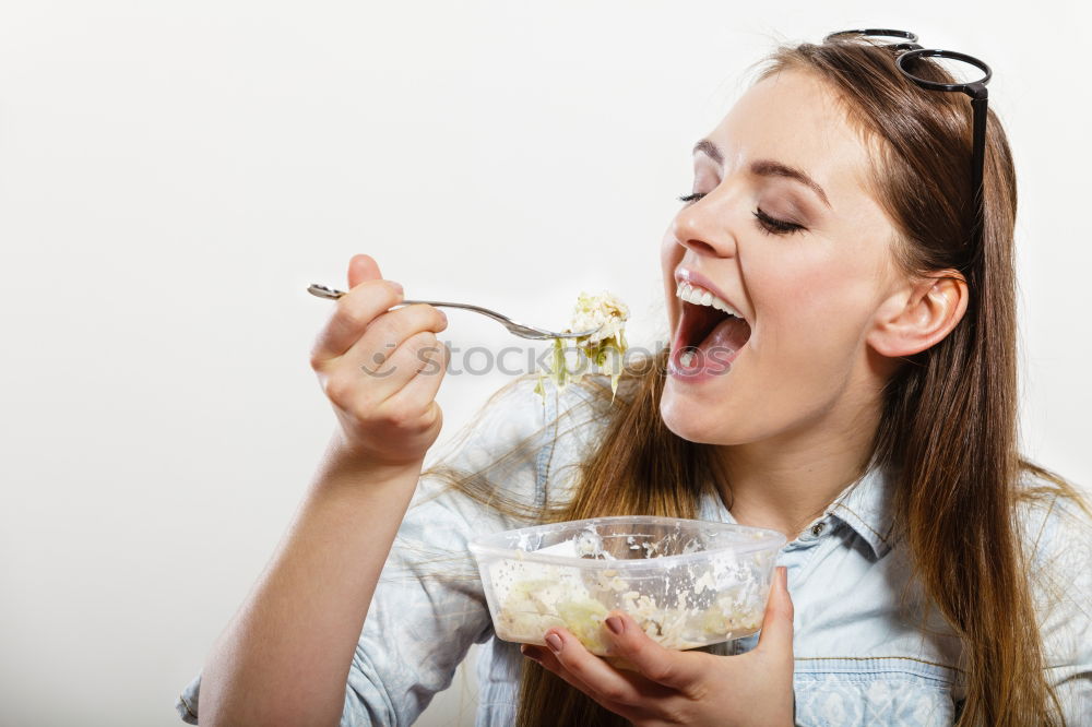 Similar – Crop woman eating sushi