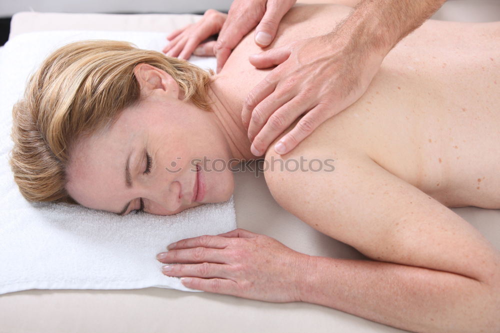 Similar – Young man having massage in spa