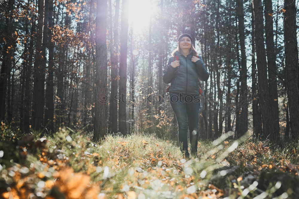 Similar – Image, Stock Photo Man taking selfie on sunny autumn road