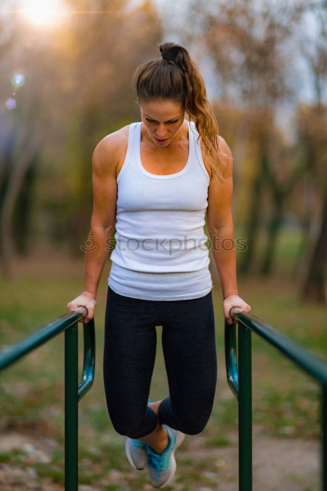 Similar – Young Woman working out outdoors and having fun