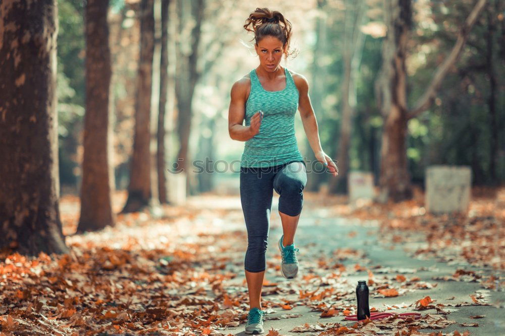 Similar – Image, Stock Photo Pretty fit young woman jogging in woodland