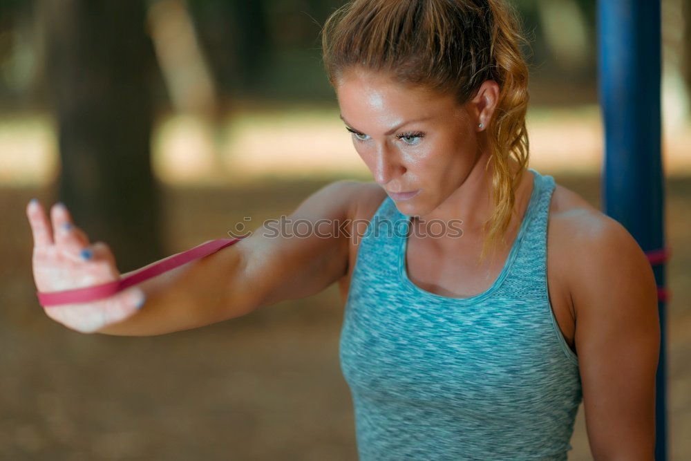 Similar – Image, Stock Photo Sportswoman doing leg stretches