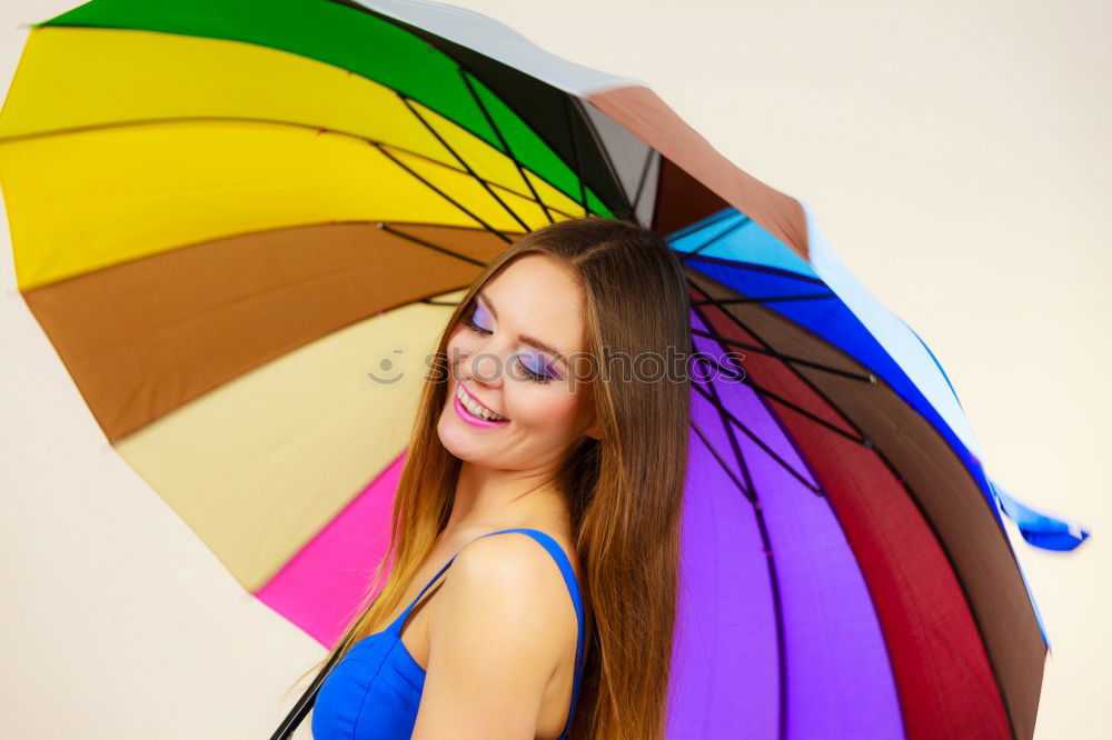 Similar – Image, Stock Photo young woman leans happily against a colourful wooden wall