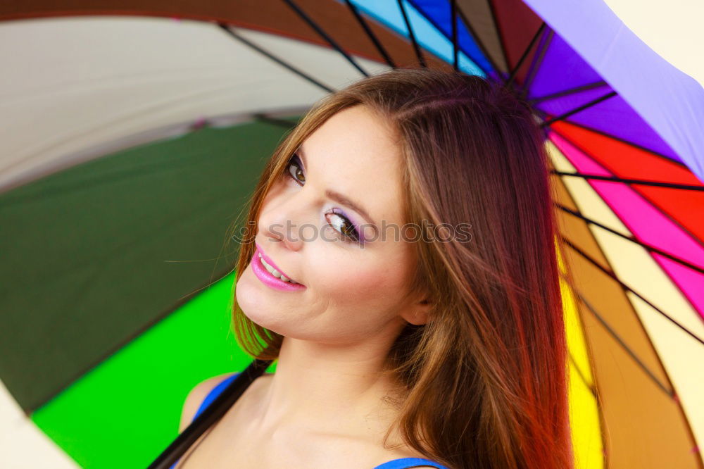 Similar – Image, Stock Photo young woman leans happily against a colourful wooden wall