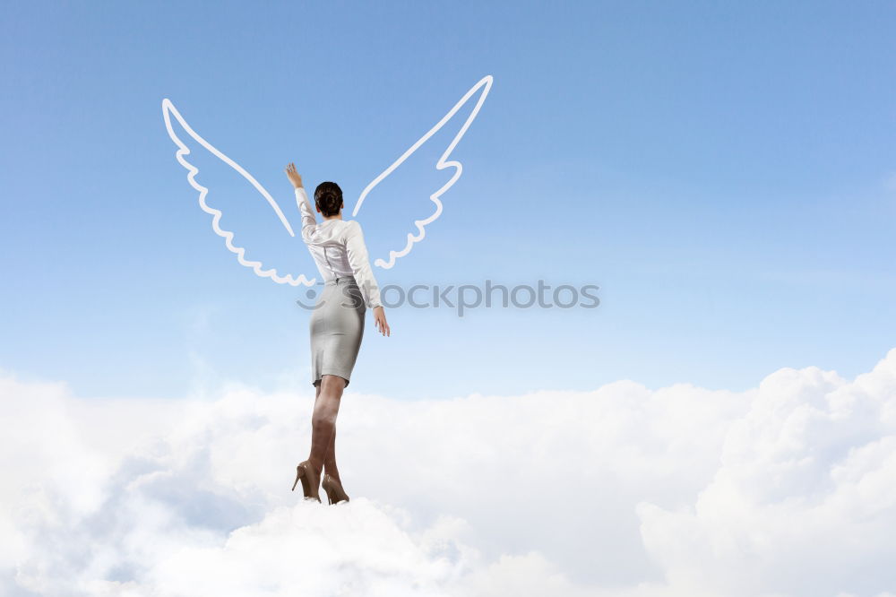 Image, Stock Photo Little girl playing with cardboard toy wings in the park at the day time. Concept of happy game. Child having fun outdoors. Picture made on the background of blue sky.